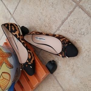 Karl Lagerfeld animal print flats trimmed with pearls.